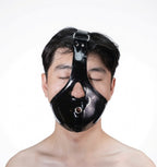 Close-up of the Leather Ball Gag Harness® showing secure locking mechanism