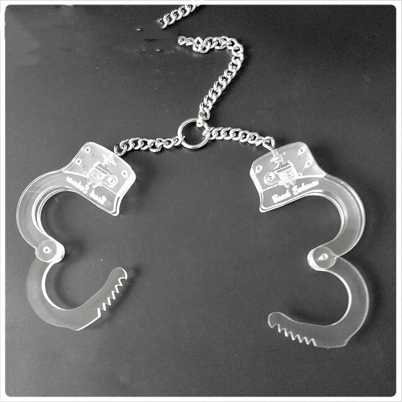Polycarbon Transparent Handucuffs ® DOMINA STORE